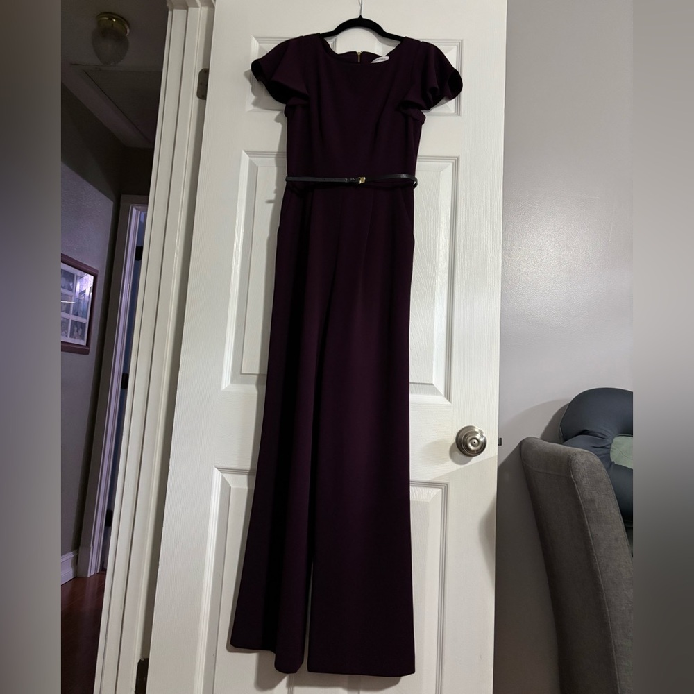 Purple jumpsuit with belt